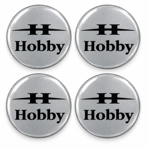 Adesivi resinati Hobby per coprimozzi – 56 mm – Set da 4 – logo H nero